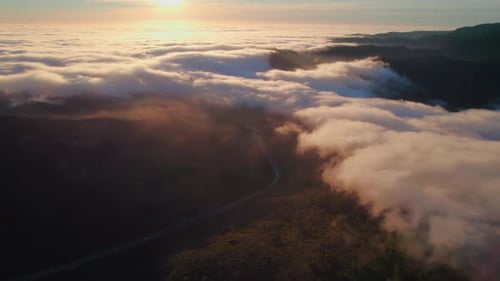 Cinematic Aerial video over a sheet of heavenly clouds
