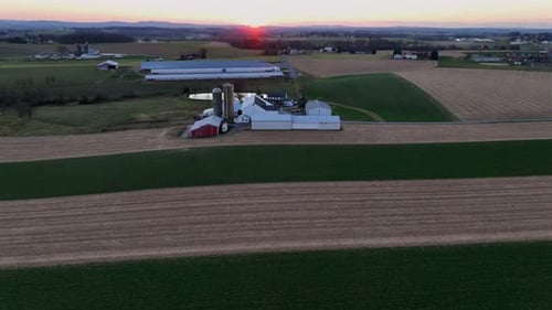 Scenic Aerial View of Farm at Sunrise