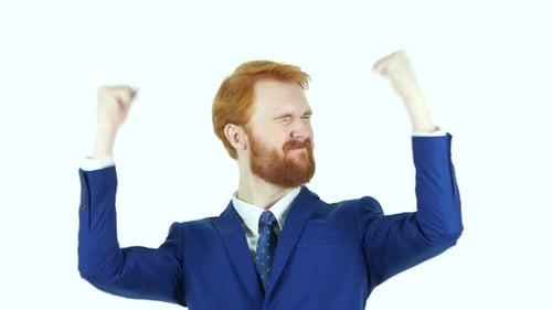 Red-Haired Man Celebrates Success