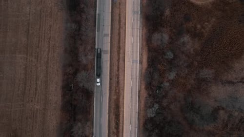 top down white pickup car hauler truck driver with empty trailer. USA Aerial 4k