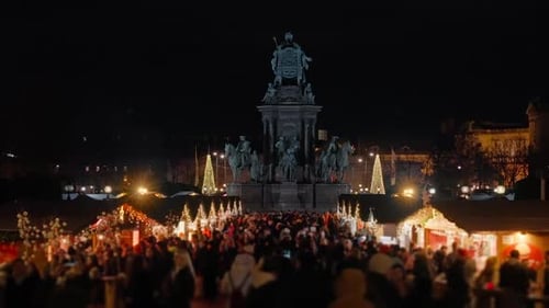 Winter Holiday Christmas Village Market Lit Up At Night on Maria-Theresien-Platz, Vienna, Austria
