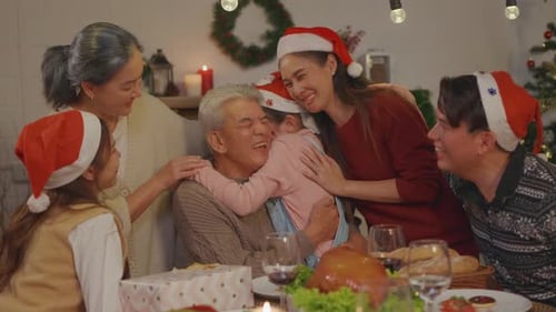 Family Christmas Celebration at Home with Santa Hats