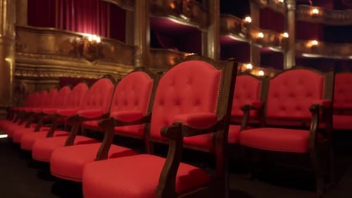 Luxurious Classical Theater Interior with Red Velvet Seats