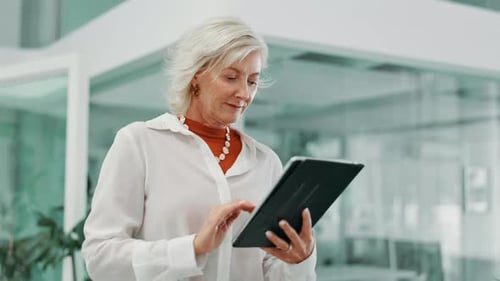 Office, mature woman and walking with tablet for scroll, email information and feedback to client