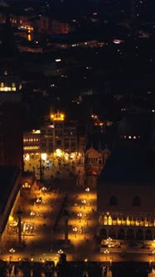 Aerial drone view of Venice City, Italy at night. Vertical
