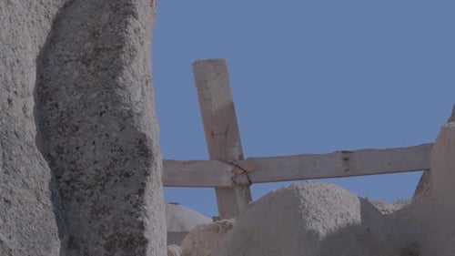 Two Horses Looking Over Wooden Farm Fence