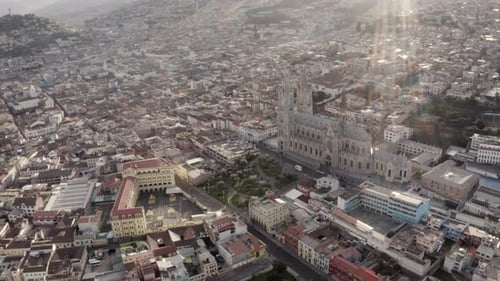 Drone shot of the historic center of Quito, Ecuador with La Basilica del Voto Nacional during quaran