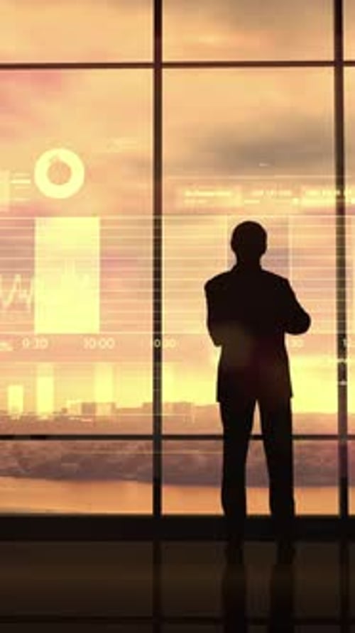 Trader Monitors the Activity of the Stock Exchange