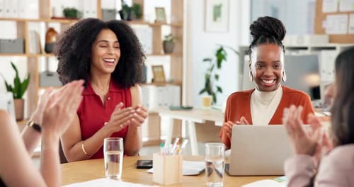 Laptop, team and women with clapping in office for campaign success, good news or milestone