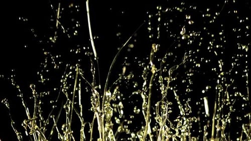 Golden Yellow Liquid Spraying Upwards Abstractly