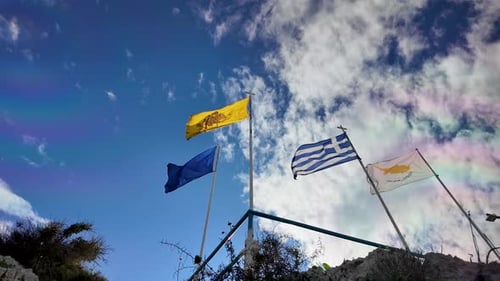 Flags of Europe, Greece, and Cyprus Waving