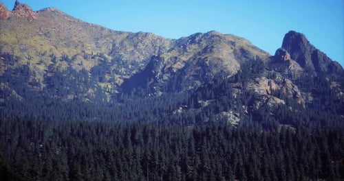 Majestic Mountain Landscape Under a Clear Blue Sky in the Afternoon