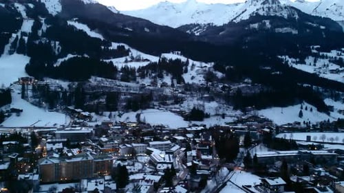Nighttime Cityscape With Snowy Streets Evening Lights Illuminate Snowy Mountain Resort Town Media