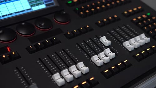 Lighting Mixer Buttons and Faders Close Up with Panning Camera Movement