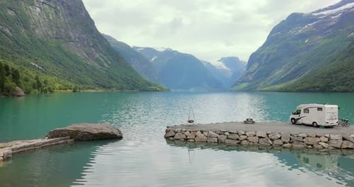 Family vacation travel RV, holiday trip in motorhome. Beautiful Nature Norway natural landscape.