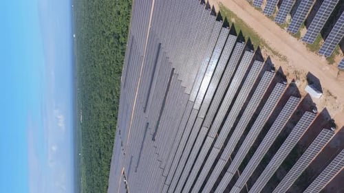 Vertical Shot Of Solar Panels - Alternative Energy, Solar Photovoltaic Power Plant In The Dominican