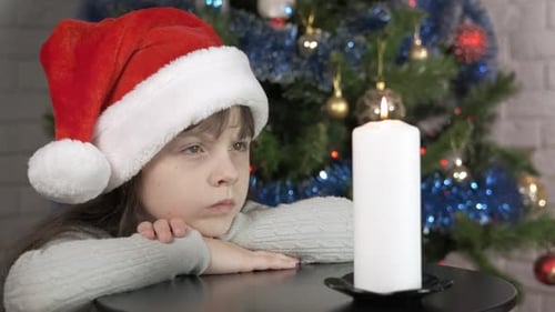 Upset Child By Burning Candle