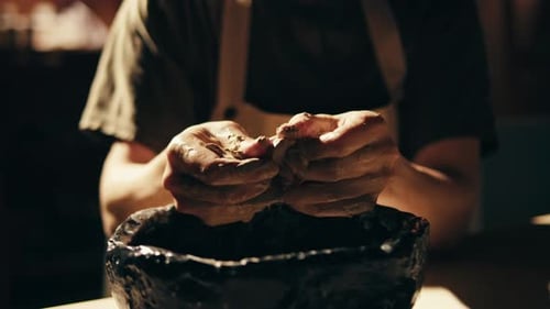 Woman Potter Works with Clay on Master Class in Studio Working Process in Ceramic Workshop Potter