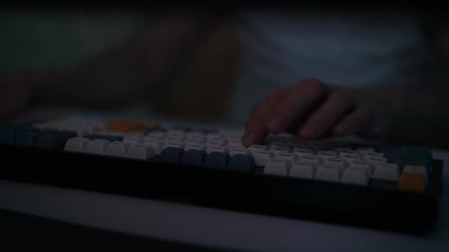 Detail Cropped Shot of Unrecognizable Gamer Male Pressing Keys on Wireless RGB Mechanical Keyboard