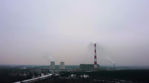 Changing of the climate. Thermal power plant emits harmful substances into the atmosphere.. Aerial