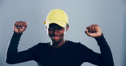 Man Celebrates with Dancing and Positive Energy