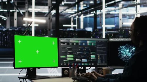 Data Center Technician Using Node Tree Software on Mockup PC to Analyze Datasets