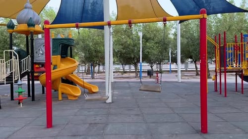 4K Colorful Playground Swings and Slide – Empty Public Park Scene
