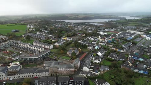 Kinsale, Ireland. Flying Above Residential Neighborhood, Row Houses With Mist on River Brandon, Dron