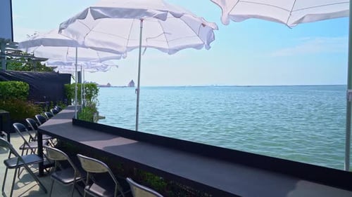 empty outdoor bar and chair with sea background