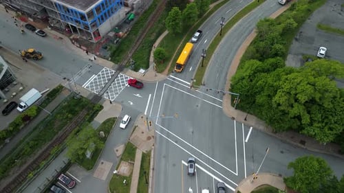 A Yellow School Bus Picks Up Children From School In Dartmouth Nova Scotia