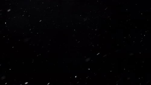 Snow Falling Effect on a Black Background