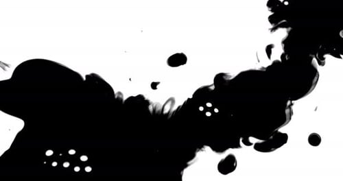 Black Ink Blot Spreads on White Background