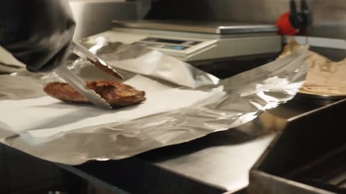 Cooking Beef Angus Steak in Restaurant Close Up Pieces of Hot Ribeye Steak Served on the Wooden