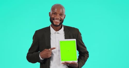 Screen, pointing and black man with tablet in studio with display, marketing