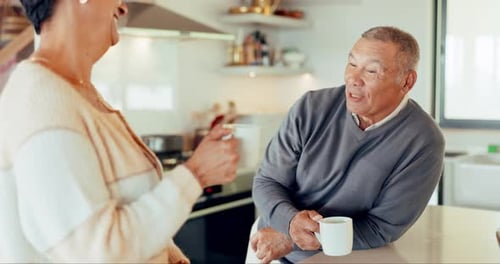 Friends Enjoy Coffee and Conversation in Modern Kitchen