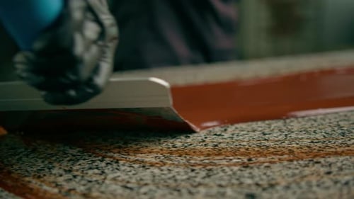 Chocolate Spreading on a Surface with Spatula