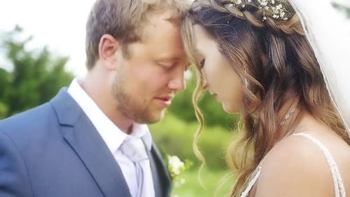Bride and Groom Touching Foreheads on Wedding Day