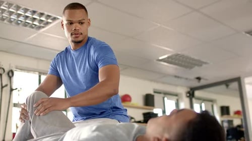 Therapist Working on Patient's Knee