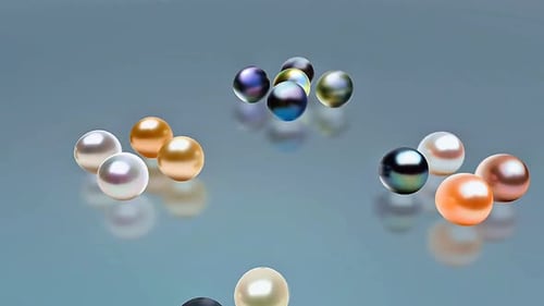 Elegant Glossy 3D Pearls Rolling Animation