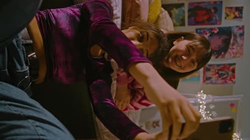 Teen Friends Posing for Photo Together in Room