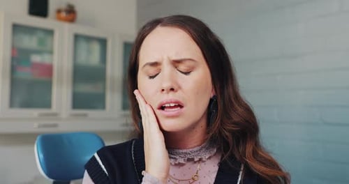 Woman, pain and cavity with dental surgery in clinic for teeth removal or oral extraction