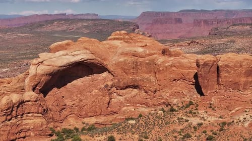 Moab red rocks on a hot day. Utah canyons with deserts in the background. Sunny summer in America