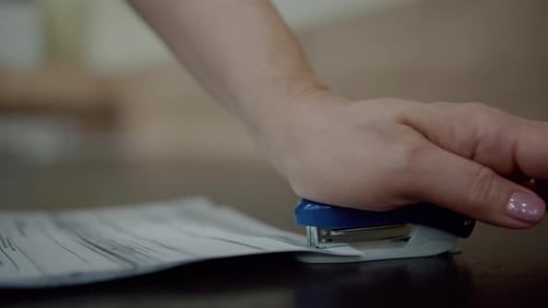 Stapler Joins Documents in Office Close Up