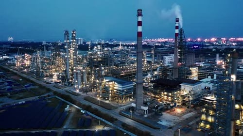 Aerial view of chimneys of power plant, an industrial district. Modern large thermal power plant