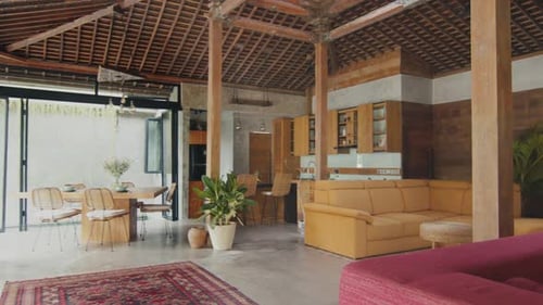 Country House with Interior with Sofa in Living Room Combined with Kitchen Area