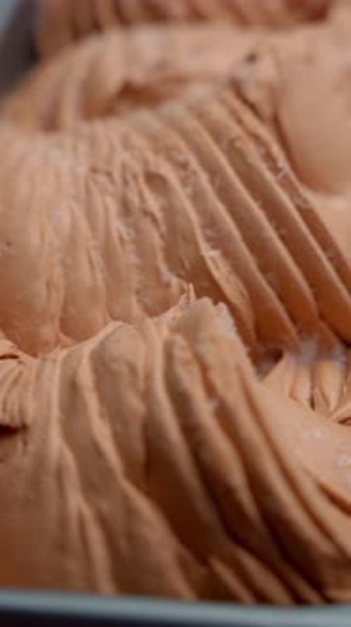 Textures of Chocolate Ice Cream Textured Waves of Chocolate Ice Cream Create Tempting Visual Feast