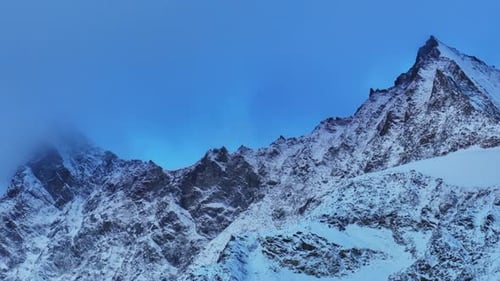 Sunrise sunset morning blue hour Saas Fee Saastal Zermatt Switzerland aerial drone gondola Metro Alp