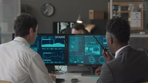 Male Colleagues Co-working at Cybersecurity Agency