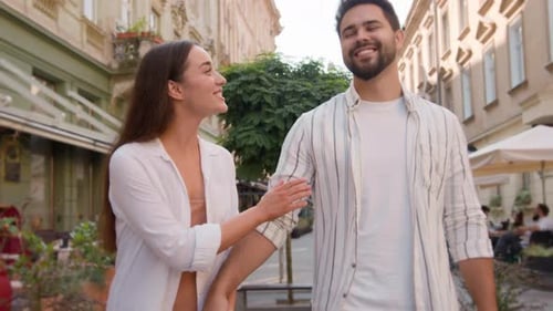 Young Couple Walking City Street Outside Together Caucasian Man Woman Talking Chatting Sightseeing
