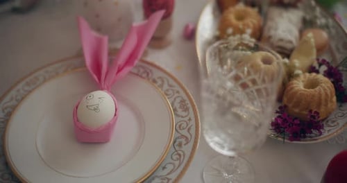 Easter Table Setting with Decorated Egg and Treats